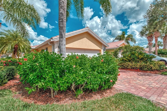 view of home's exterior with a garage