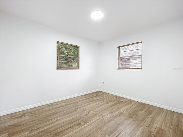 empty room with light wood-type flooring