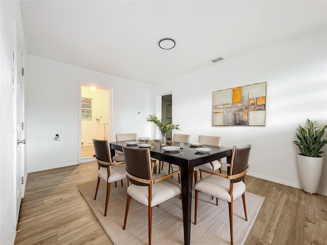 dining area featuring light hardwood / wood-style floors