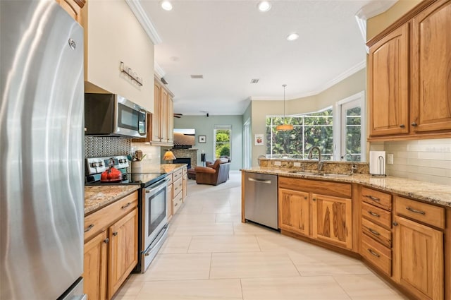 kitchen featuring appliances with stainless steel finishes, light tile patterned flooring, sink, and backsplash