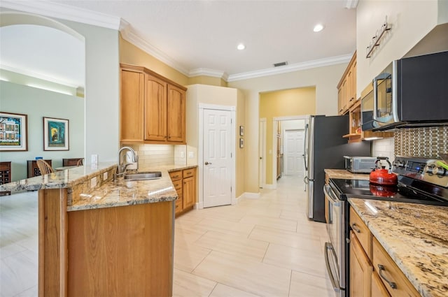 kitchen featuring light tile patterned flooring, backsplash, sink, light stone counters, and stainless steel electric range