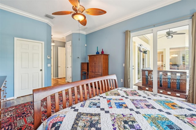 bedroom featuring ceiling fan, crown molding, and hardwood / wood-style flooring