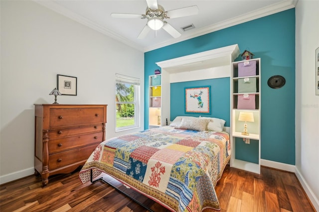 bedroom featuring ceiling fan, crown molding, and dark hardwood / wood-style floors