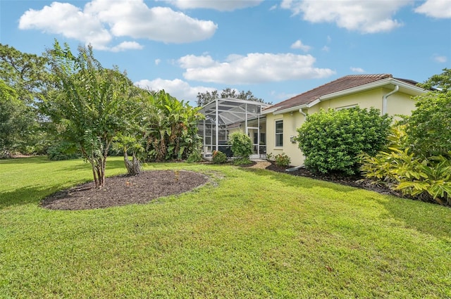 view of yard with a lanai