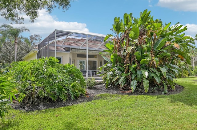 view of yard with a lanai