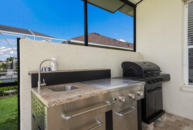 view of patio / terrace with a sink