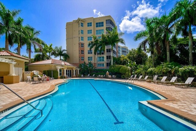 view of swimming pool featuring a patio