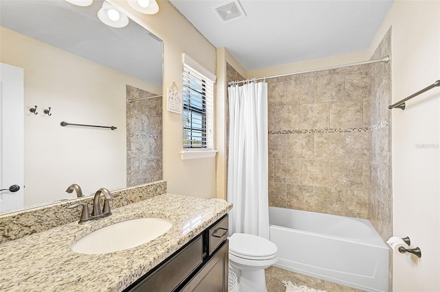 full bathroom with visible vents, toilet, tile patterned floors, shower / bath combination with curtain, and vanity