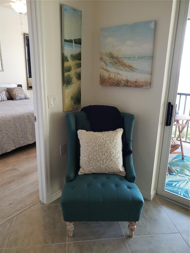 sitting room featuring light hardwood / wood-style flooring