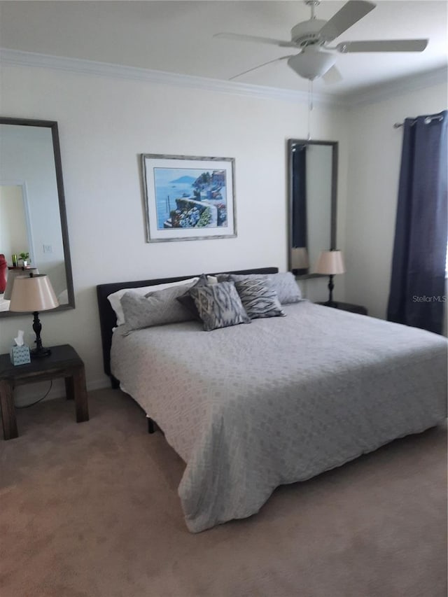 bedroom with ceiling fan, carpet flooring, and ornamental molding