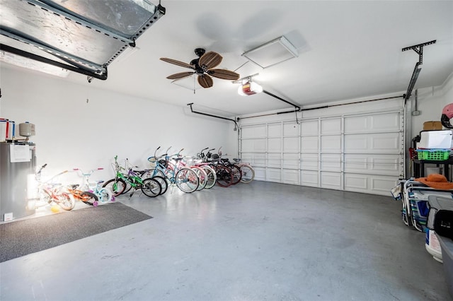 garage featuring a garage door opener and ceiling fan