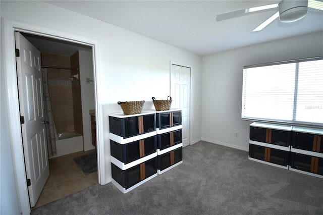 bedroom with ceiling fan, a closet, and carpet floors