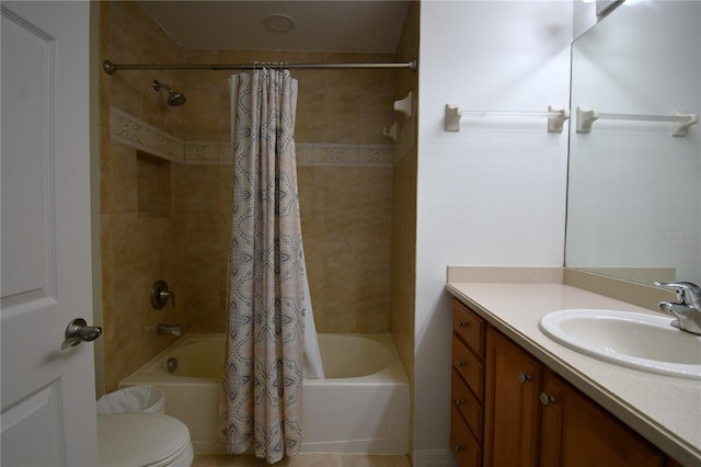 full bathroom with vanity, toilet, and shower / tub combo