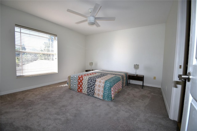 bedroom with ceiling fan and carpet floors