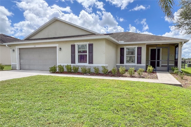 ranch-style home with a front lawn and a garage