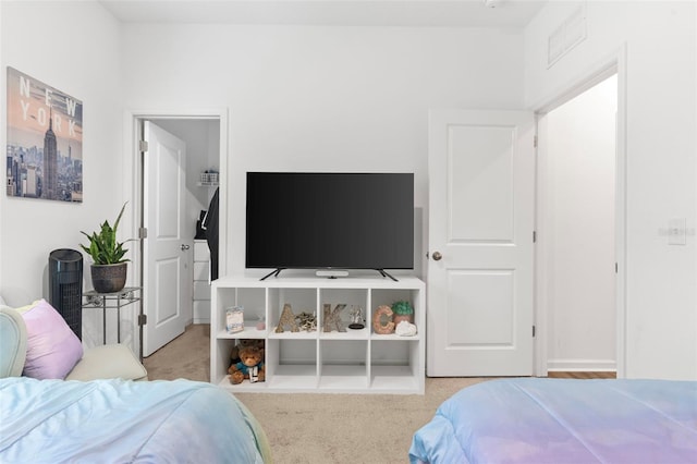 carpeted bedroom with visible vents