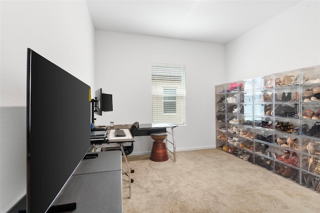 carpeted office with baseboards