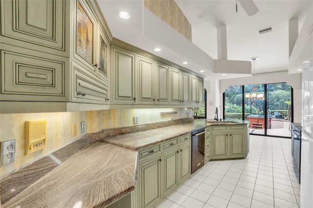 kitchen featuring dishwasher, kitchen peninsula, hanging light fixtures, sink, and green cabinetry