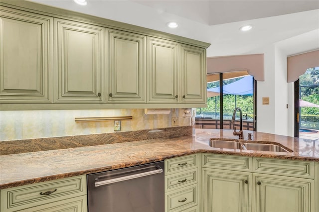 kitchen with dishwasher, tasteful backsplash, sink, and light stone counters