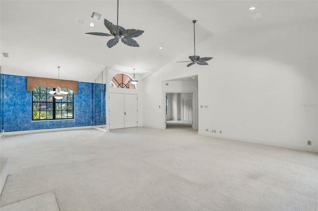 unfurnished living room featuring light colored carpet, high vaulted ceiling, and ceiling fan