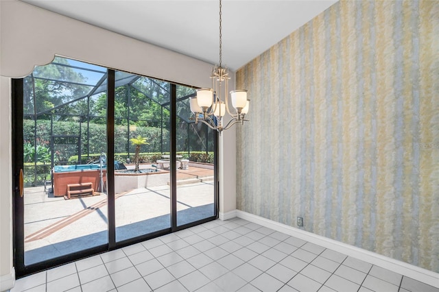 unfurnished dining area with tile patterned floors and an inviting chandelier