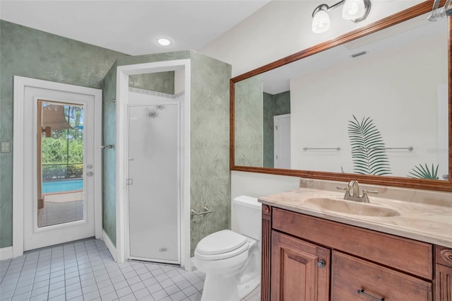 bathroom featuring vanity, tile patterned flooring, toilet, and an enclosed shower