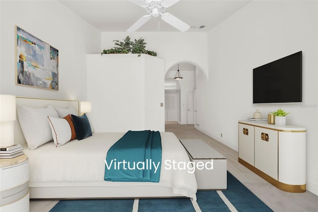 bedroom featuring ceiling fan