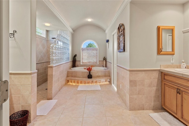 bathroom featuring tile patterned floors, walk in shower, tile walls, and a bath