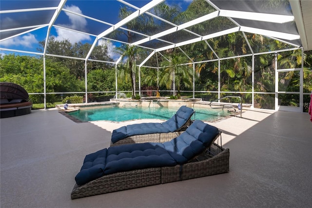 outdoor pool featuring a patio area and glass enclosure