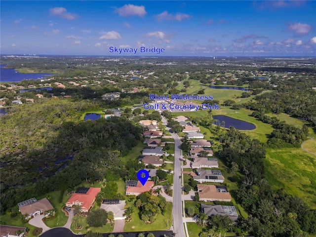 aerial view featuring a water view, a residential view, and golf course view