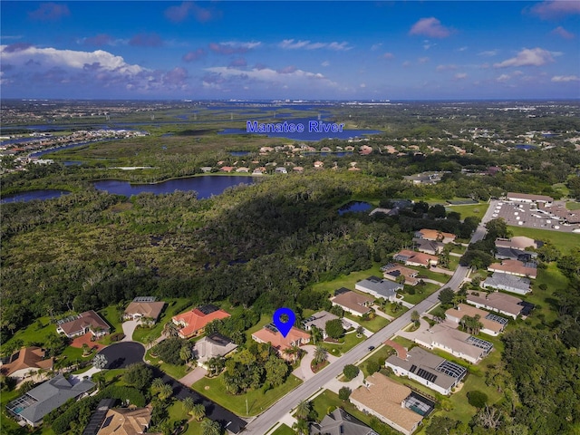 bird's eye view with a water view and a residential view