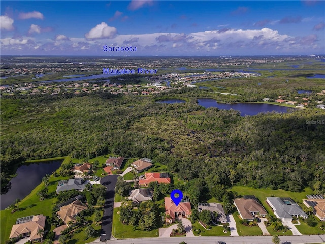 bird's eye view with a residential view and a water view