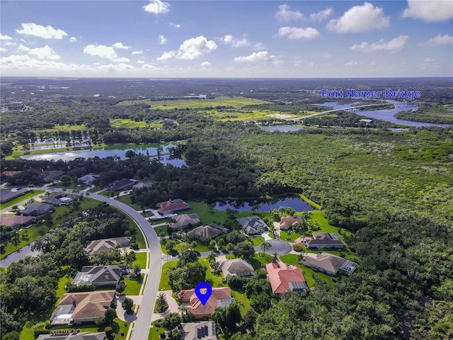 aerial view with a residential view and a water view