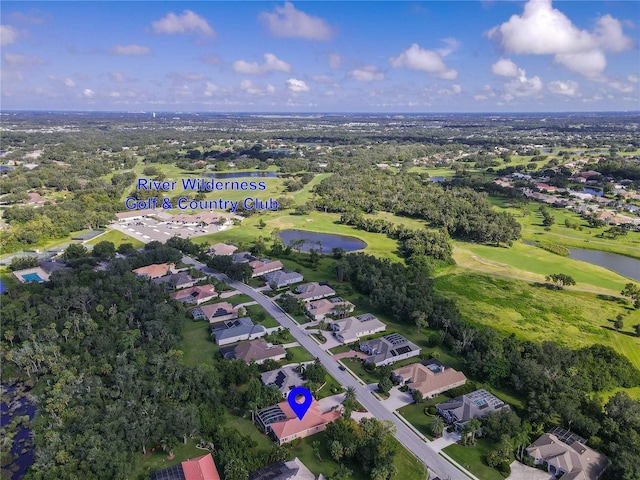 bird's eye view featuring a water view, a residential view, and golf course view