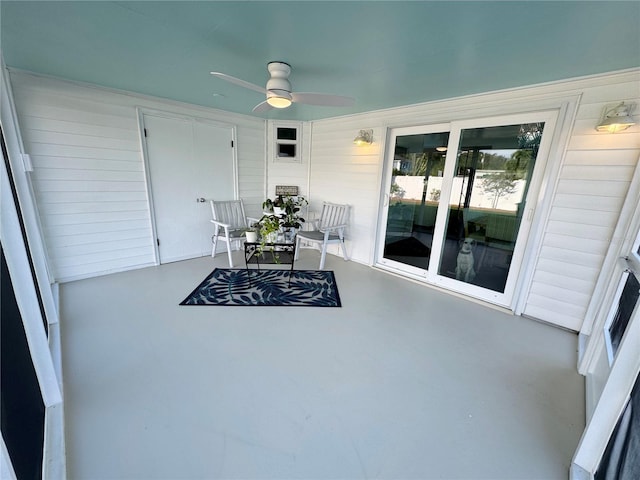 view of patio featuring ceiling fan