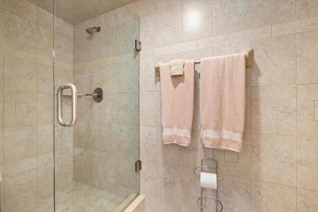 full bathroom featuring a stall shower