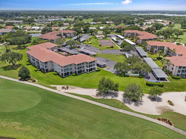 birds eye view of property featuring view of golf course