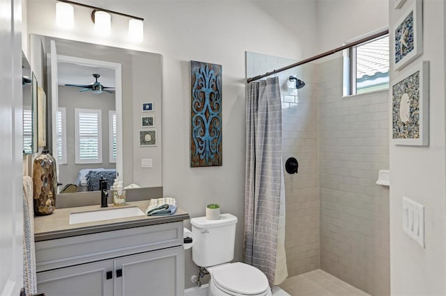 bathroom with plenty of natural light, toilet, and a shower with shower curtain