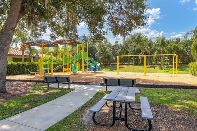 view of jungle gym with a lawn