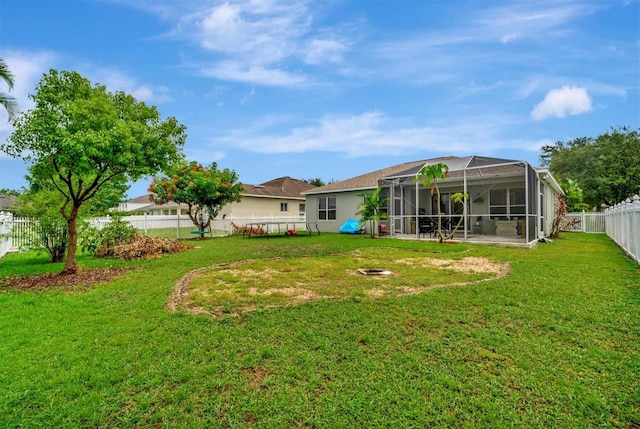 view of yard featuring a lanai