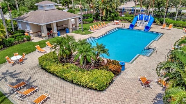 view of swimming pool featuring a patio area