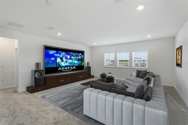 carpeted home theater room with visible vents, baseboards, and recessed lighting