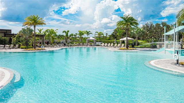 pool featuring a patio and fence