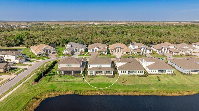 bird's eye view with a water view and a residential view