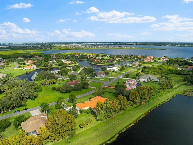 bird's eye view with a water view