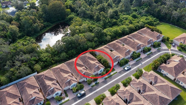 aerial view with a water view and a residential view