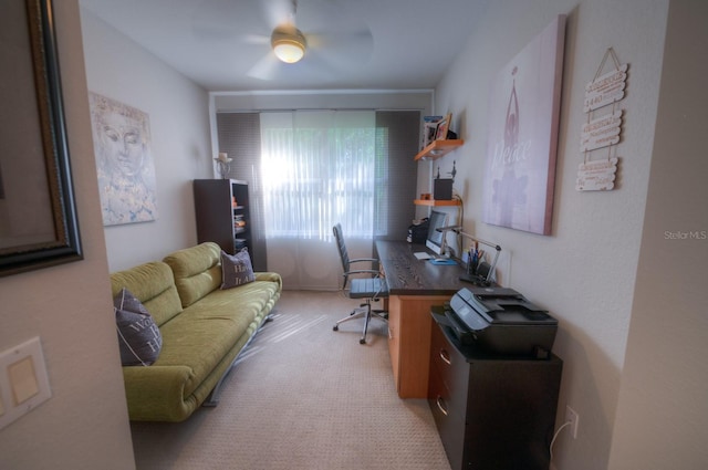 office featuring light carpet and ceiling fan