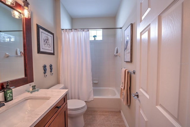 bathroom with shower / bathtub combination with curtain, vanity, toilet, and tile patterned floors