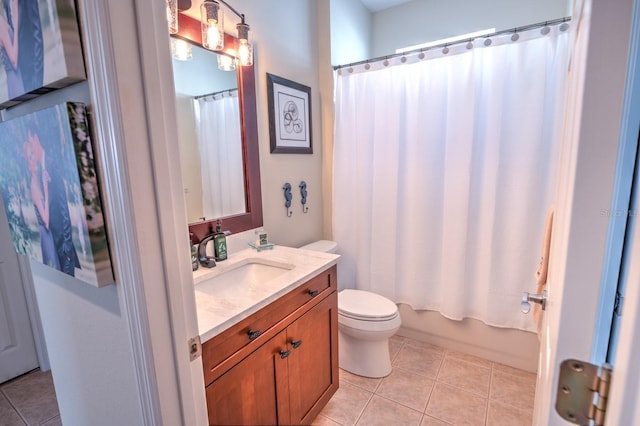 bathroom featuring vanity, toilet, and tile patterned floors