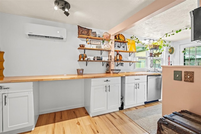 bar with wooden counters, plenty of natural light, stainless steel dishwasher, and a wall mounted air conditioner